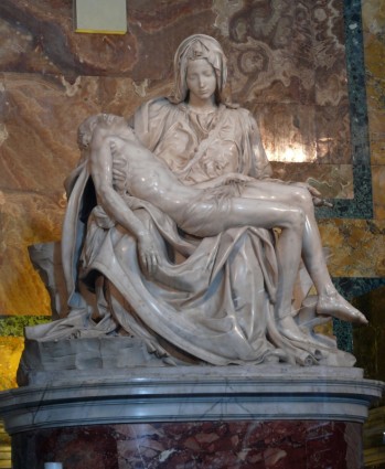 Photograph of Michelangelo's Pieta at the Vatican. Mary holding the dead Jesus across her lap.