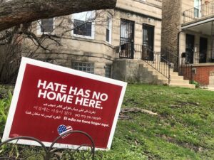 Yard sign saying hate has no home here